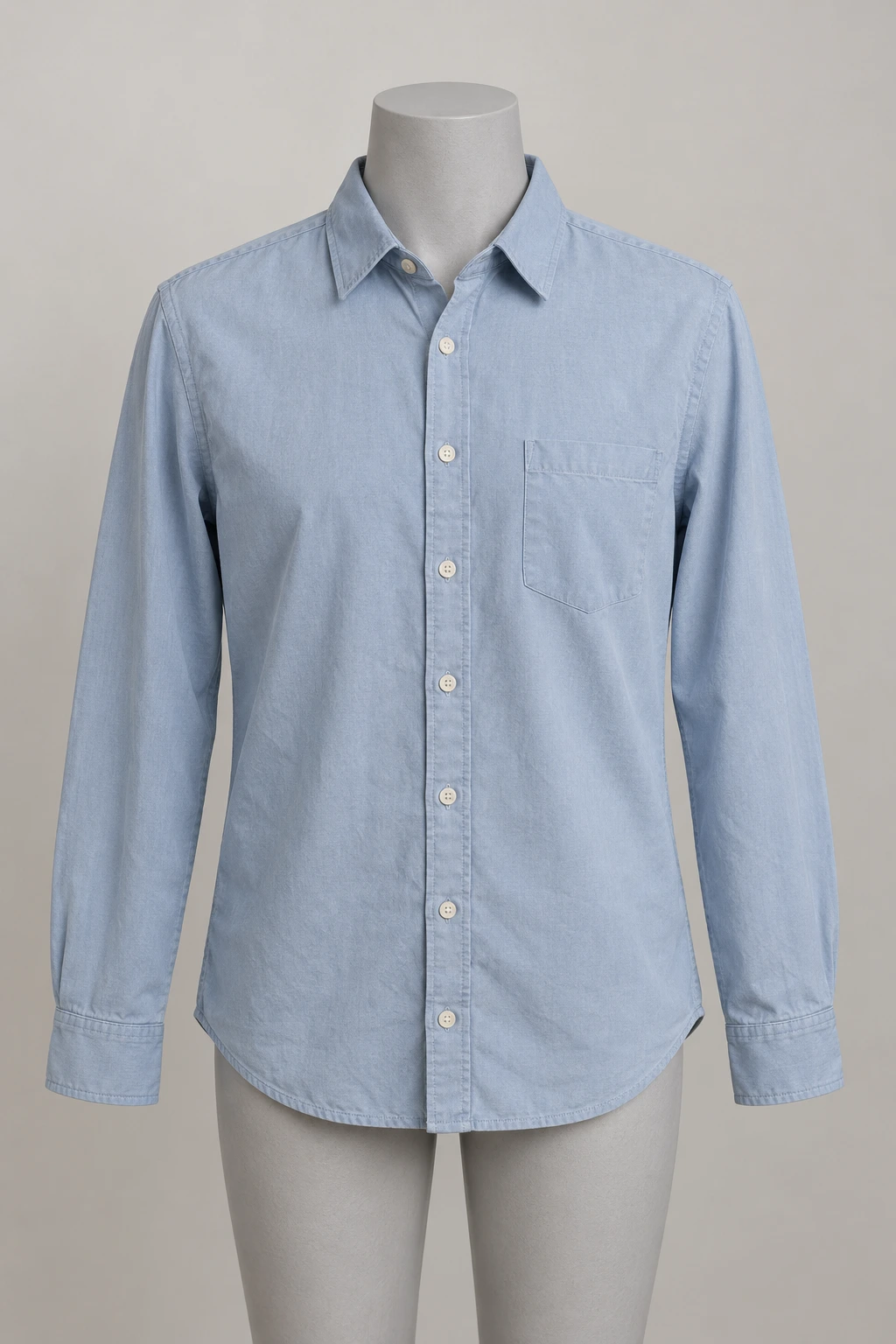 Blue button-down shirt displayed on a gray mannequin.